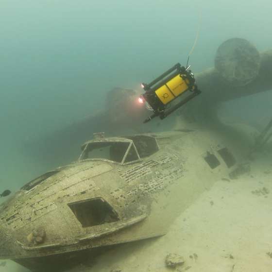 Boxfish ROV Exploring a Plane Wreck Underwater